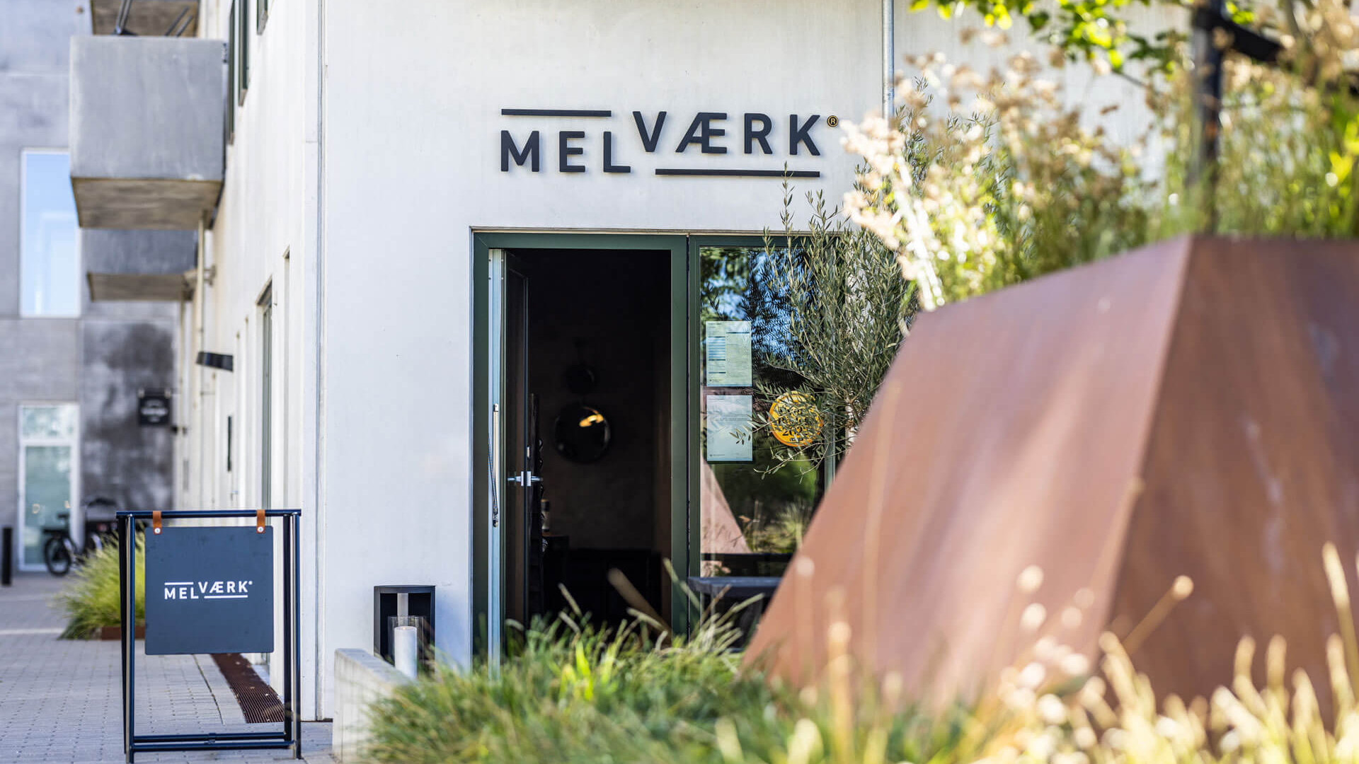 Melv&aelig;rk resturant front with signage by Camilla Wedege