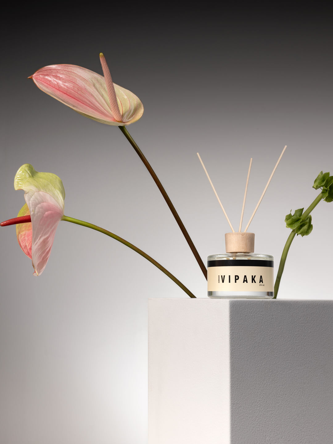 Humdakin fragrance dispenser on podium with art direction by Camilla Wedege