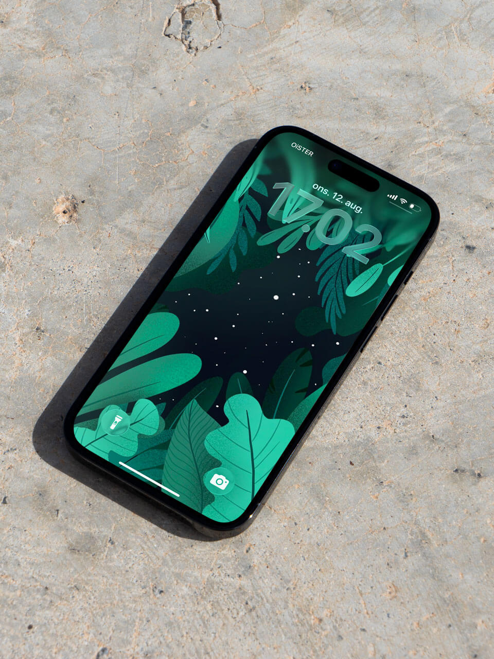Screensaver illustration in a iPhone mockup on warm concrete floor